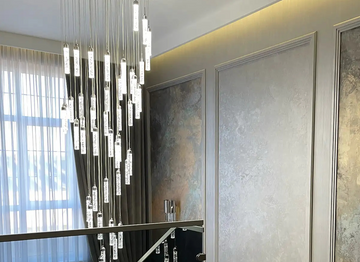 A Vertical Light Installation for a Five-Story Living Space