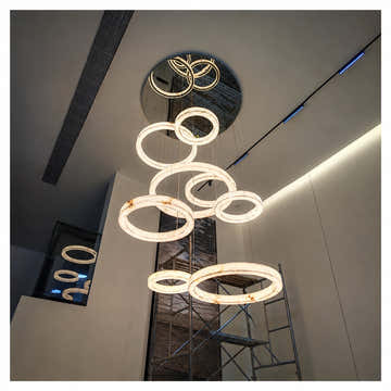 PROJECT: Custom Marble Ring Staircase Chandelier Installation