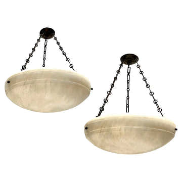 Pair of French Carved Alabaster Fixtures. Sold Individually.