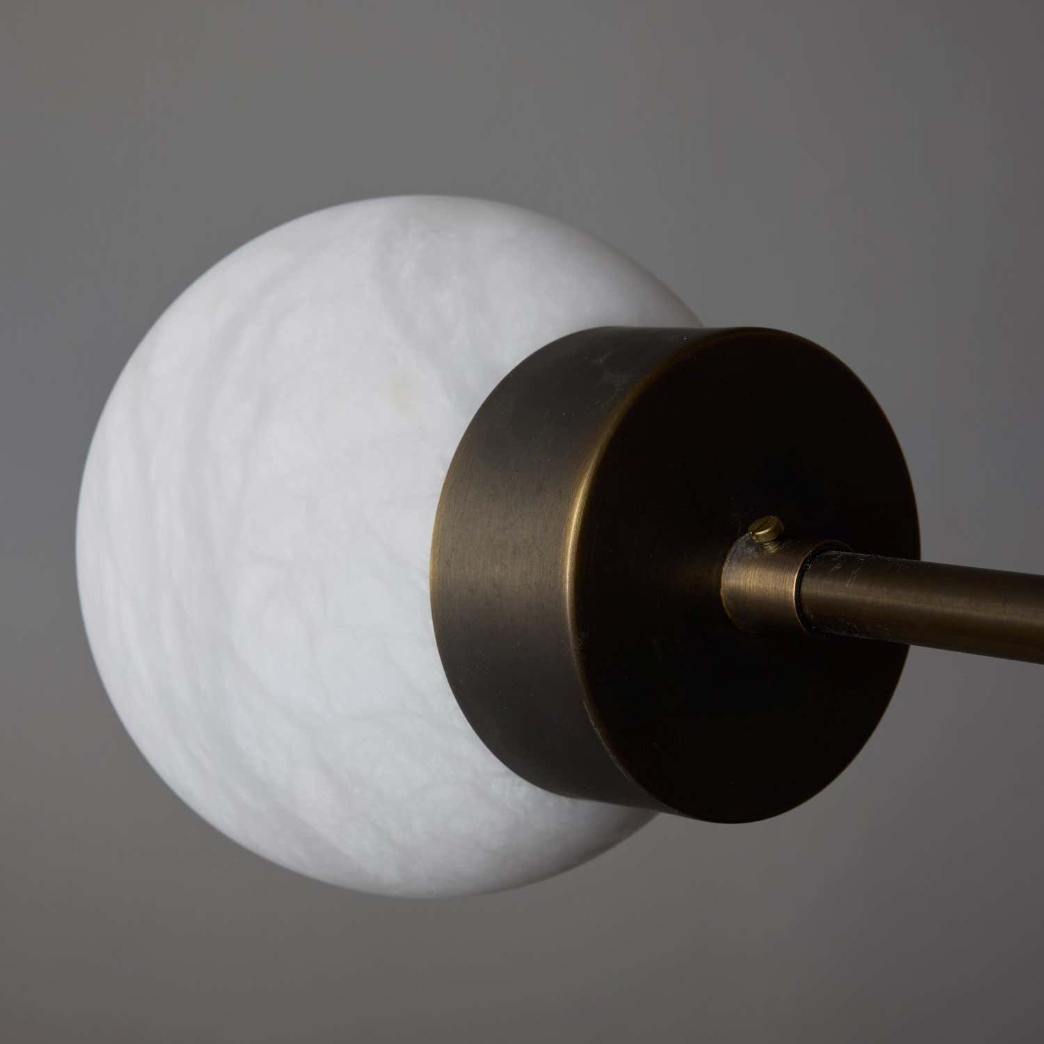 Brass and Alabaster Globes Asymmetrical Line Chandelier