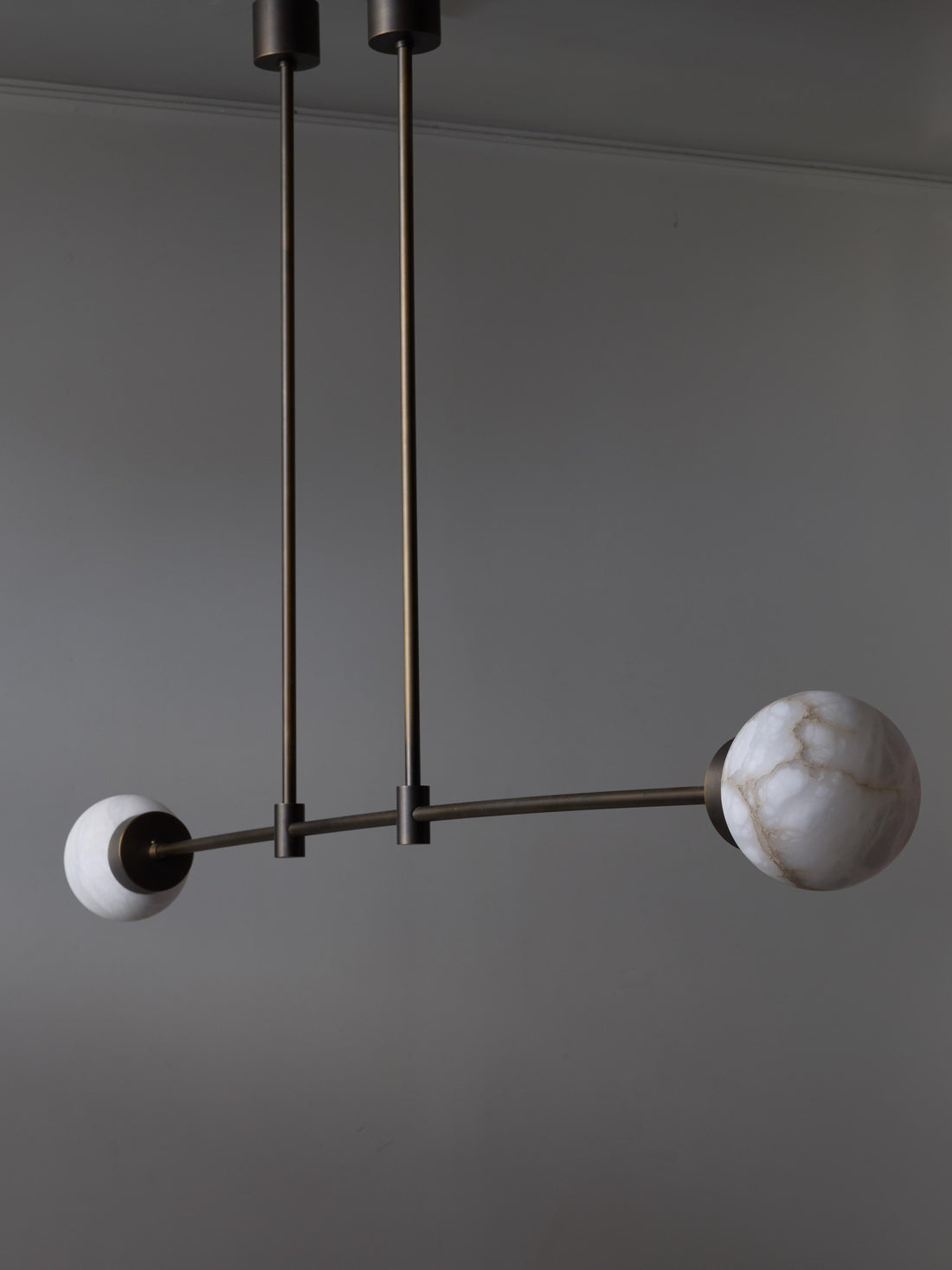 Brass and Alabaster Globes Asymmetrical Line Chandelier