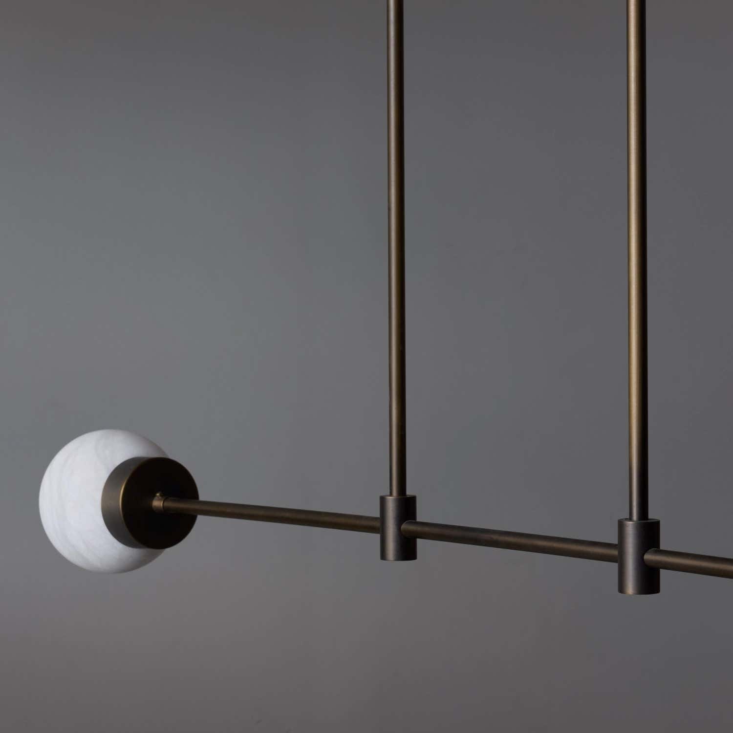 Brass and Alabaster Globes Asymmetrical Line Chandelier