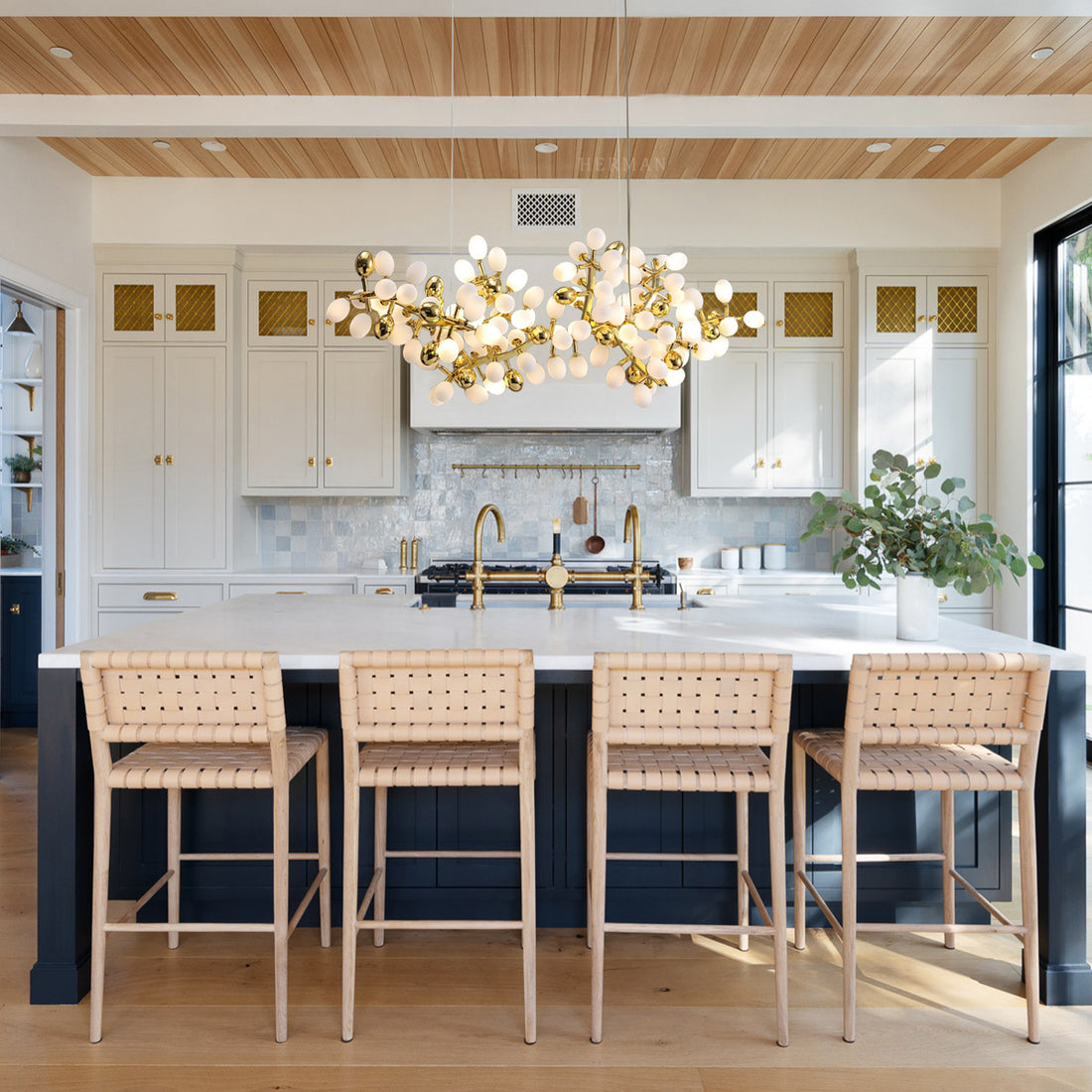 Post Modern Linear Grape Branch Chandelier Over Dining Table