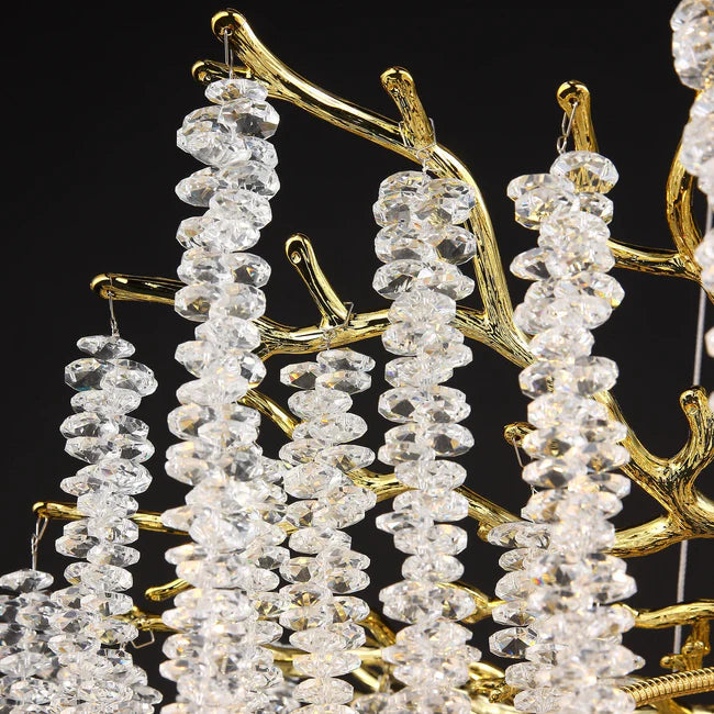 Modern Gold Coin Crystal Linear Branch Chandelier Over Dining Table