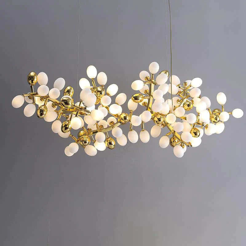 Post Modern Linear Grape Branch Chandelier Over Dining Table