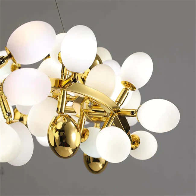 Post Modern Linear Grape Branch Chandelier Over Dining Table